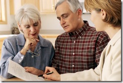 Senior couple meeting with agent